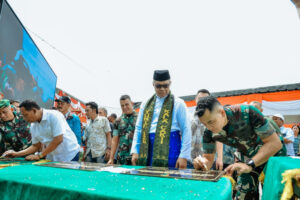 Pj. Nizhamul Resmikan Gapura dan Rumah Jaga Yonif 126/KC