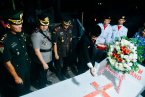 Pj. Bupati Batu Bara Pimpin Pawai Obor dan Upacara Taptu Sambut HUT ke-79 Kemerdekaan RI