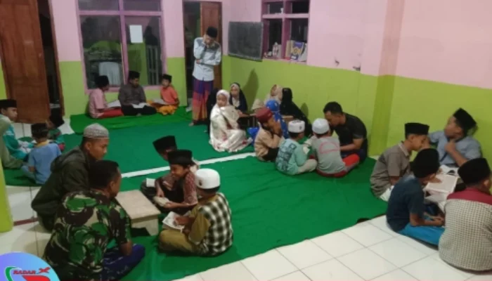 Tim Satgas TMMD 123 Ajak Anak-Anak Desa Trotosari Mengaji Bersama
