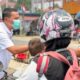 Kualitas Udara Puruk Cahu Memburuk, Dinkes Bagikan Masker kepada Warga
